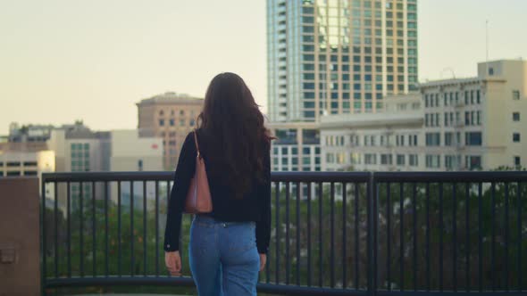 Unknown Young Lady Walking on Observation Deck