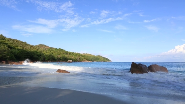 Beautiful Waves At Sunrise On The Beach Anse Lazio