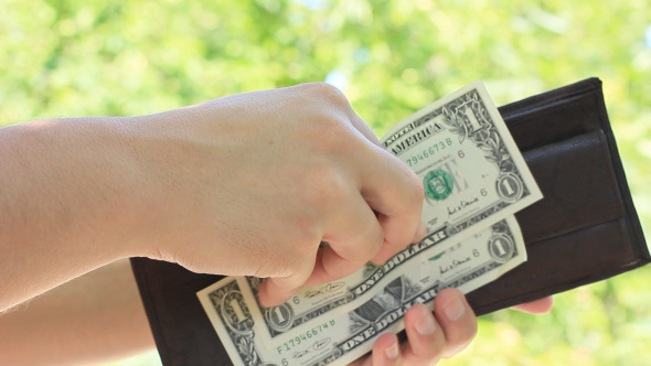 Man Taking Dollar Banknote Money From His Wallet