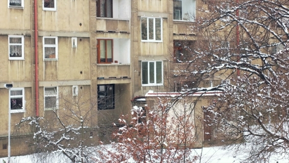 Block Building Covered In Snow