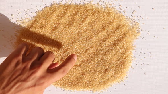 Man Hand Draw Heart on Surface of Sugar