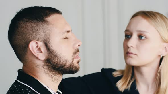 Makeup Artist Applying Makeup On Handsome Person