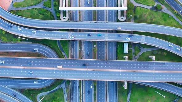 4K : Aerial Hyper lapse drone view of road junction with moving cars.