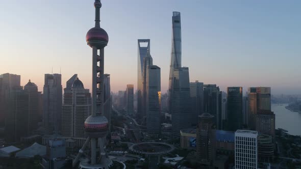 Aerial view of Shanghai skyline at sunset, China.