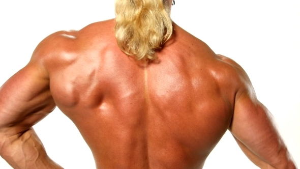 Strongman Showing His Muscular Back 1
