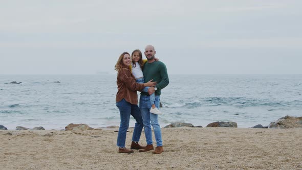 Portrait of Young Happy Family