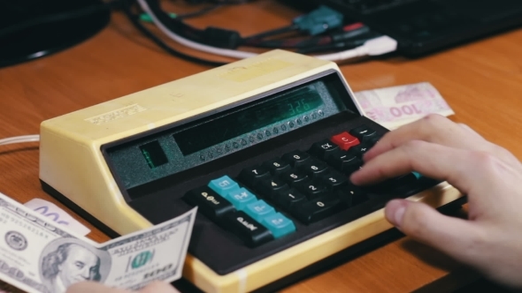 Counting Money On a Old Calculator