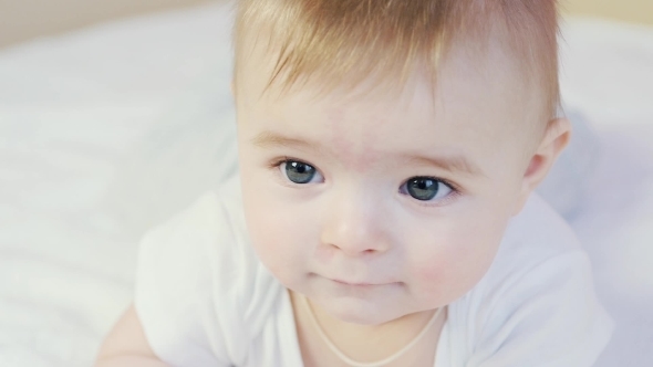 Face Of Cute Surprised Little Baby Boy,