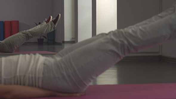 Woman Doing  Exercise Scissors.