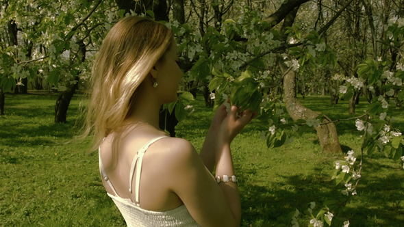 Young Woman Walking At The Park