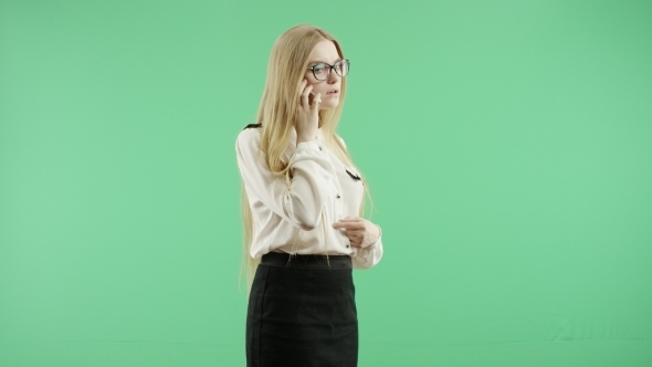 Business Woman Speaks On The Phone Green Screen