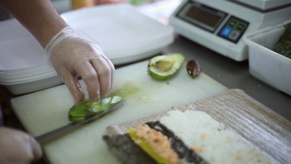 The Chef Slices the Knife Avocado