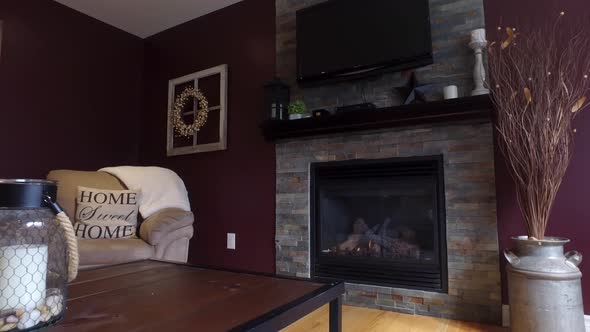 stylish living room and fireplace sliding forward view.