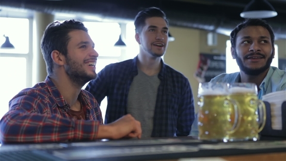 Three Men With Beer Rejoice The Victory Of Team