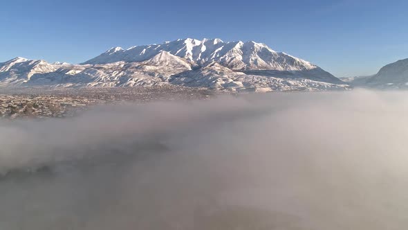 Aerial view of fog over city viewing houses