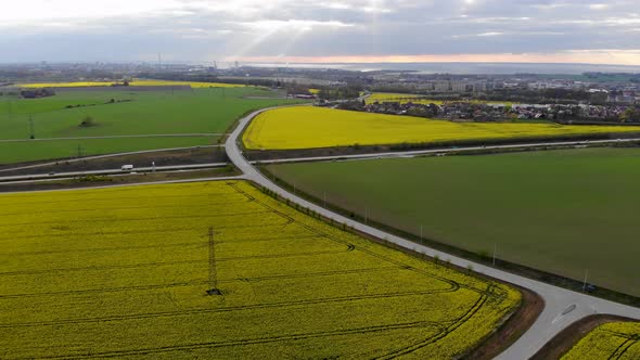 Drone view of rapsmark in south Sweden, Malmo in background