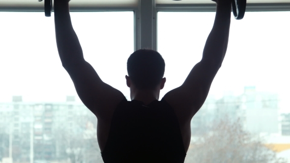 Athlete Trains With a Barbell alt