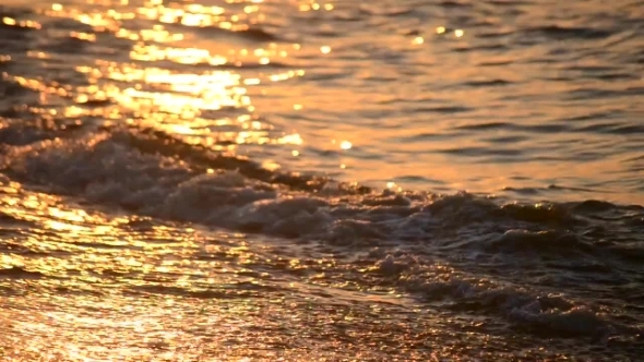 The Sun Is Reflected In The Waves Of The Sea