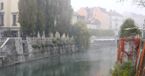 Ljubljanica River And Buildings In The Background