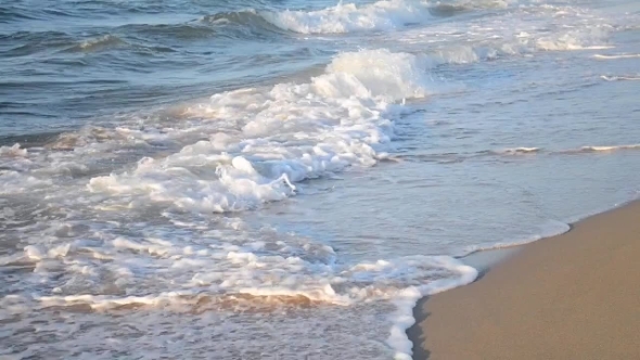 Waves Lapping On a Sandy Beach