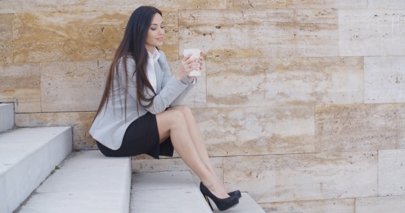 Business Woman Looking At Coffee Cup