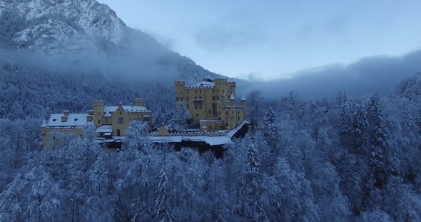Aerial View Of Hohenschwangau Castle At Sunrise In Winter Landscape.