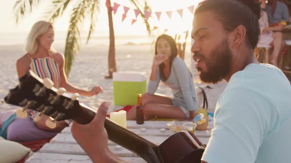 Friends enjoying a party on the beach