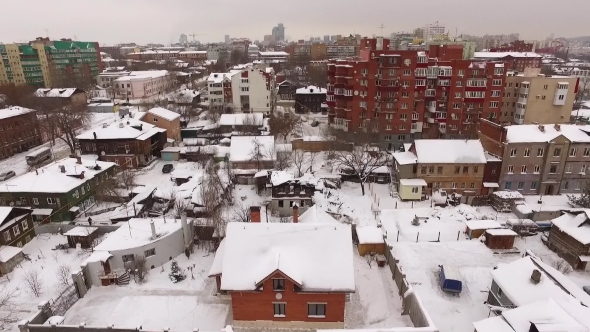 Aerial Winter City Drone Flies Over Yard