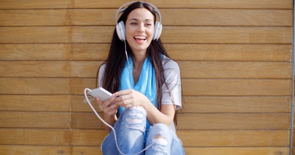 Happy Woman Enjoying Her Music