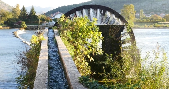 a Water Wheel To Lift Water For Irrigation Of Grape Fields