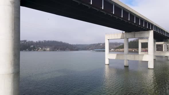 Aerial Flying Under Toll Bridge Crossing Ozarks Lake, Missouri