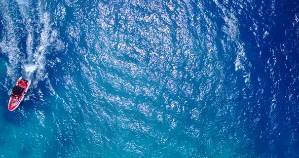 Daytime above clean view of a summer white paradise sand beach and turquoise sea background in high 