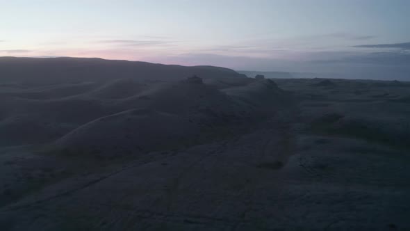 Forwards Fly Above Barren Countryside