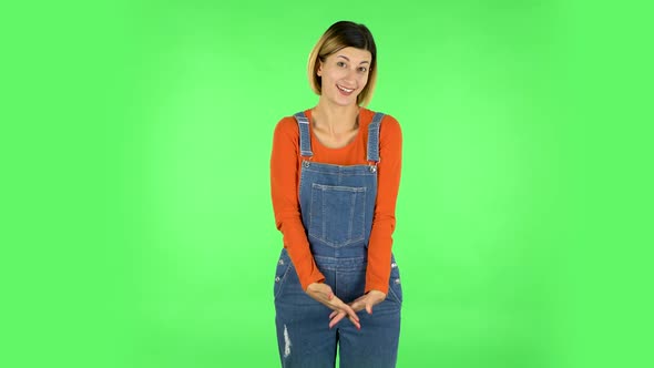 Woman Throwing Up Hands Expressing She Is Innocent. Green Screen