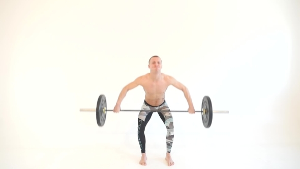 Muscular Man Lifting Weights