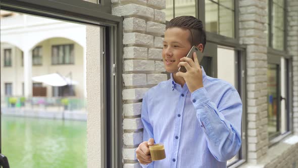 Young businessman talking on the phone.