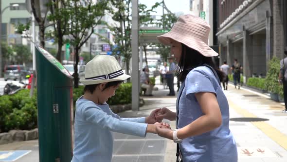 Asian Children Playing Together While Travel In Japan
