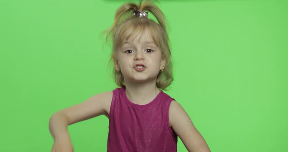 Girl in Purple Dress Tells Something. Happy Four Years Old Child. Chroma Key
