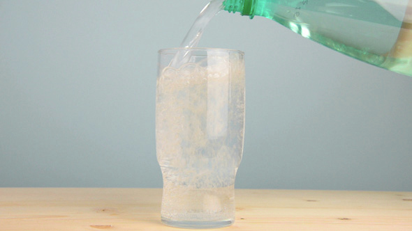 Pouring  Mineral Water in a Glass