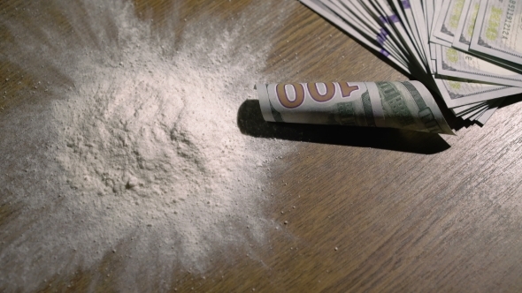 Cocaine and Rolled 100 Dollar Bank Note