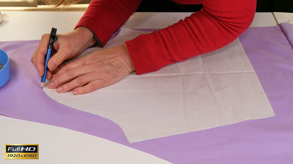 Seamstress Making Clothes Pattern