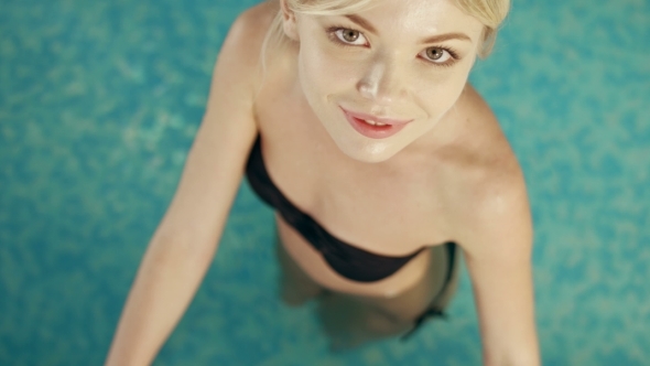 Beautiful And Attractive Girl Posing In The Swimming Pool