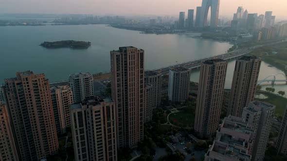 Suzhou, China - April 01, 2019: Aerial Shot Over Residential Apartment Buildings on Sunset. Aerial