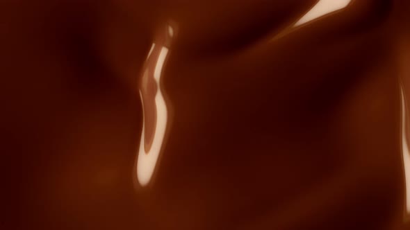 Super Slow Motion Shot of Swirling Chocolate Background at 1000Fps
