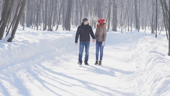 Couple Holding Each Other's Hands, The Winter Goes On The Road