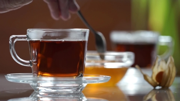 Transparent Cup Of Tea On The Table