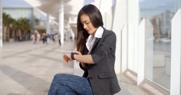 Attractive Woman Checking The Time