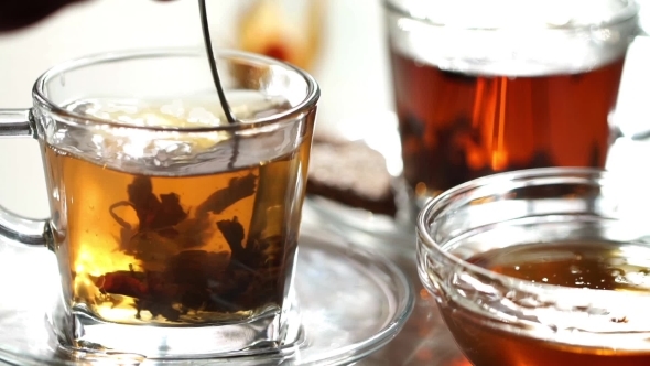 Brew Tea In a Beautiful Glass Cup