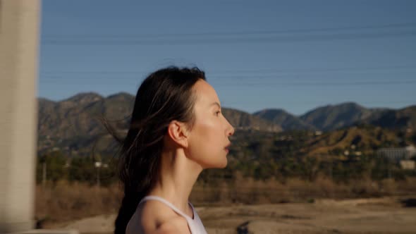 Attractive asian woman going for her morning run