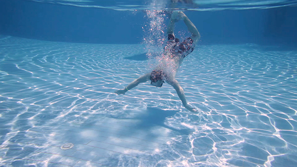 Teenager Floats In Pool